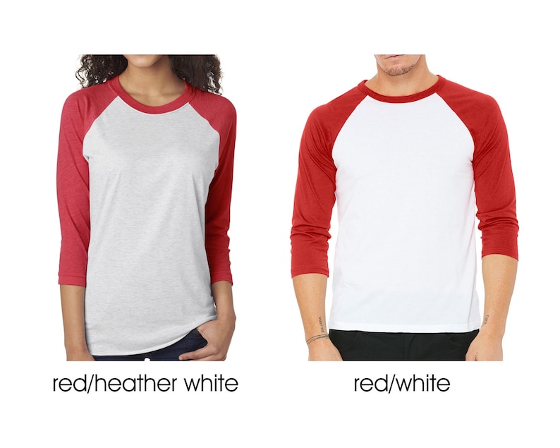 May include: Two baseball t-shirts, one with red sleeves and a heather white body, and the other with red sleeves and a white body.