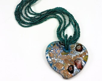 Heart Pendant on Aqua Seed Bead Multi String Necklace Blue Copper Glitter and White with Flowers