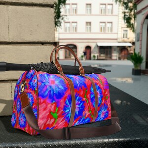 Artwork blue floral with red Waterproof Travel Bag
