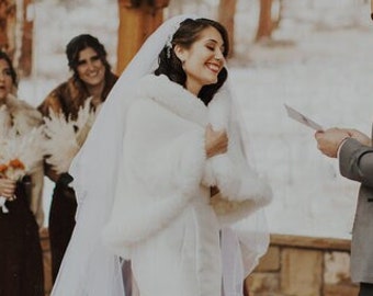 white bridal fur coat