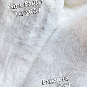 May include: Close-up of two white faux fur fabrics. The fabric on the left is labeled "Faux Rabbit (ivy05)" and the fabric on the right is labeled "Faux Fox (ivy07)".