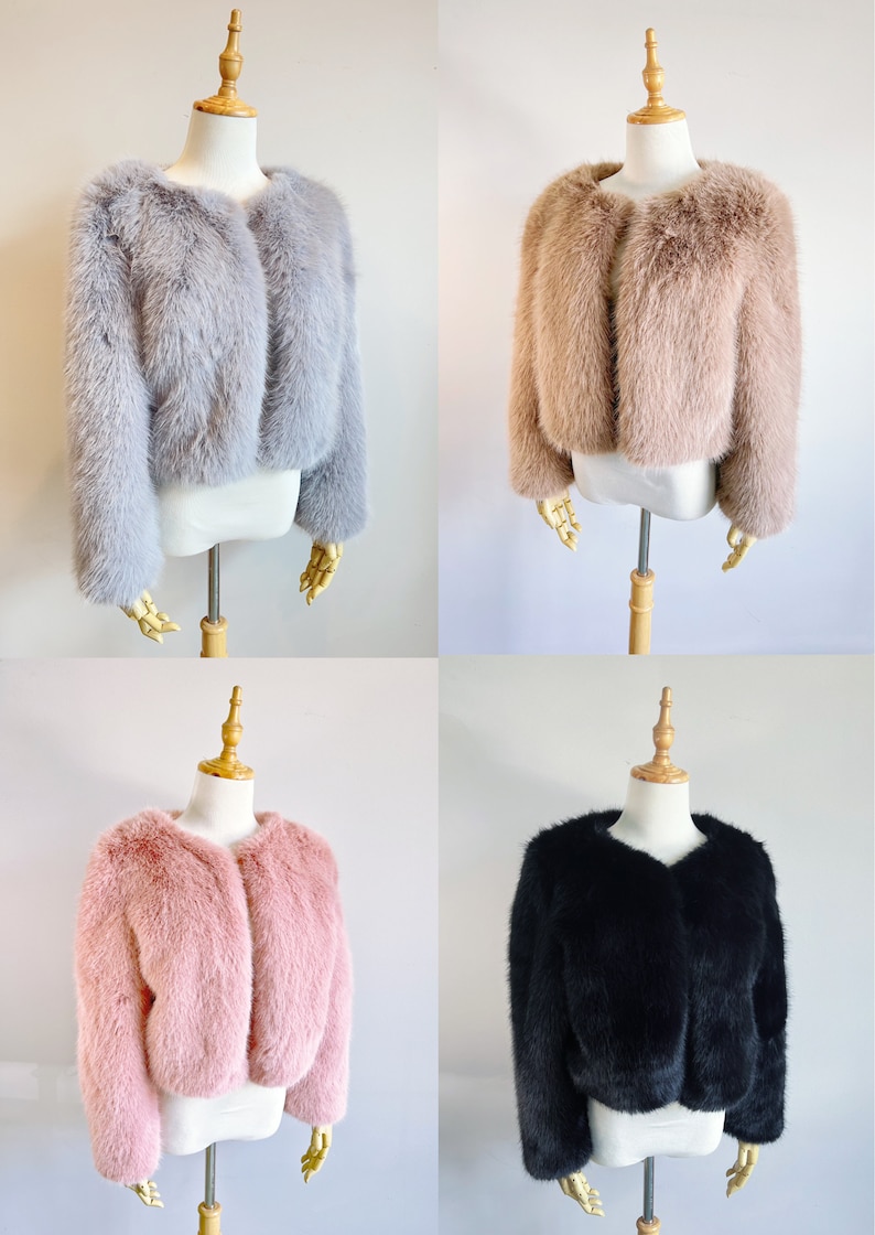 May include: Four faux fur jackets on mannequins. The jackets are in gray, brown, pink, and black.