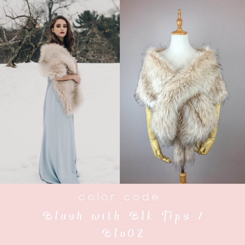 May include: A faux fur shawl in a blush color with black tips. The shawl is draped over a mannequin and a person wearing a light blue dress. The text "color code Blush with Blk Tips / Blu02" is displayed below the image.