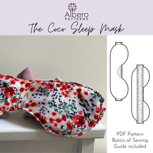 Puede incluir: Una máscara para dormir floral con fondo blanco y flores rojas, azules y verdes. La máscara está sobre una superficie blanca. La imagen también incluye una ilustración en blanco y negro del patrón de la máscara para dormir. El texto "The Coco Sleep Mask" está en la parte superior de la imagen. El texto "PDF Pattern Basics of Sewing Guide included" está en la parte inferior de la imagen.