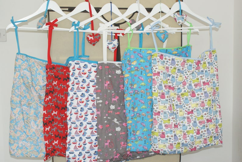 Handmade Hanging Storage Bags complete with a white wooden Etsy