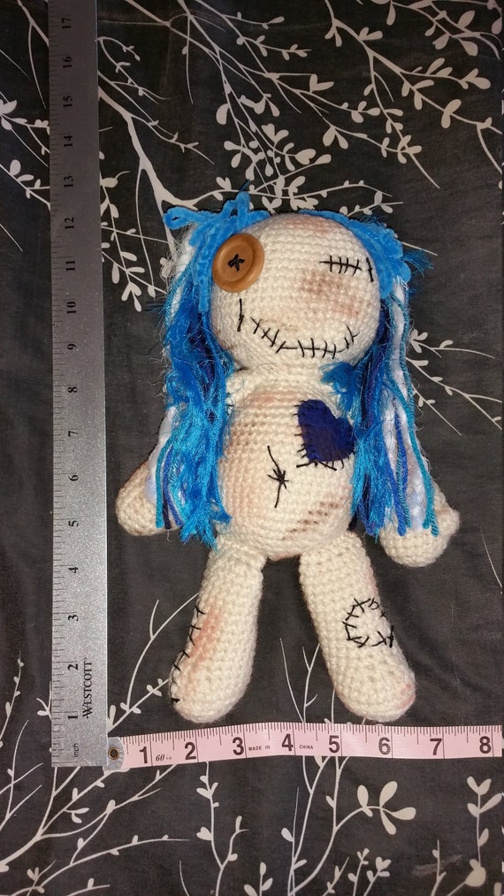 blue voodoo doll