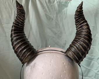 Golden, curled horns headpiece for cosplay, Halloween, and other costumes
