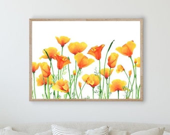 Puede incluir: Una pintura de acuarela enmarcada de un campo de amapolas de California naranjas sobre un fondo blanco. La pintura se exhibe en una pared blanca sobre un sofá blanco con almohadas.