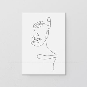 Puede incluir: Dibujo minimalista de una línea negra del perfil de una mujer sobre un fondo blanco. La obra de arte presenta una línea continua que forma la cara, incluyendo el ojo, la nariz, los labios y la oreja. El texto "EXPLICIT DESIGN" y "@explicit" está en la parte inferior.