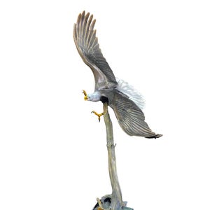 Tuudi/Pursuit  20&quot; eagle bronze by Frank Entsminger in a limited edition of 36.