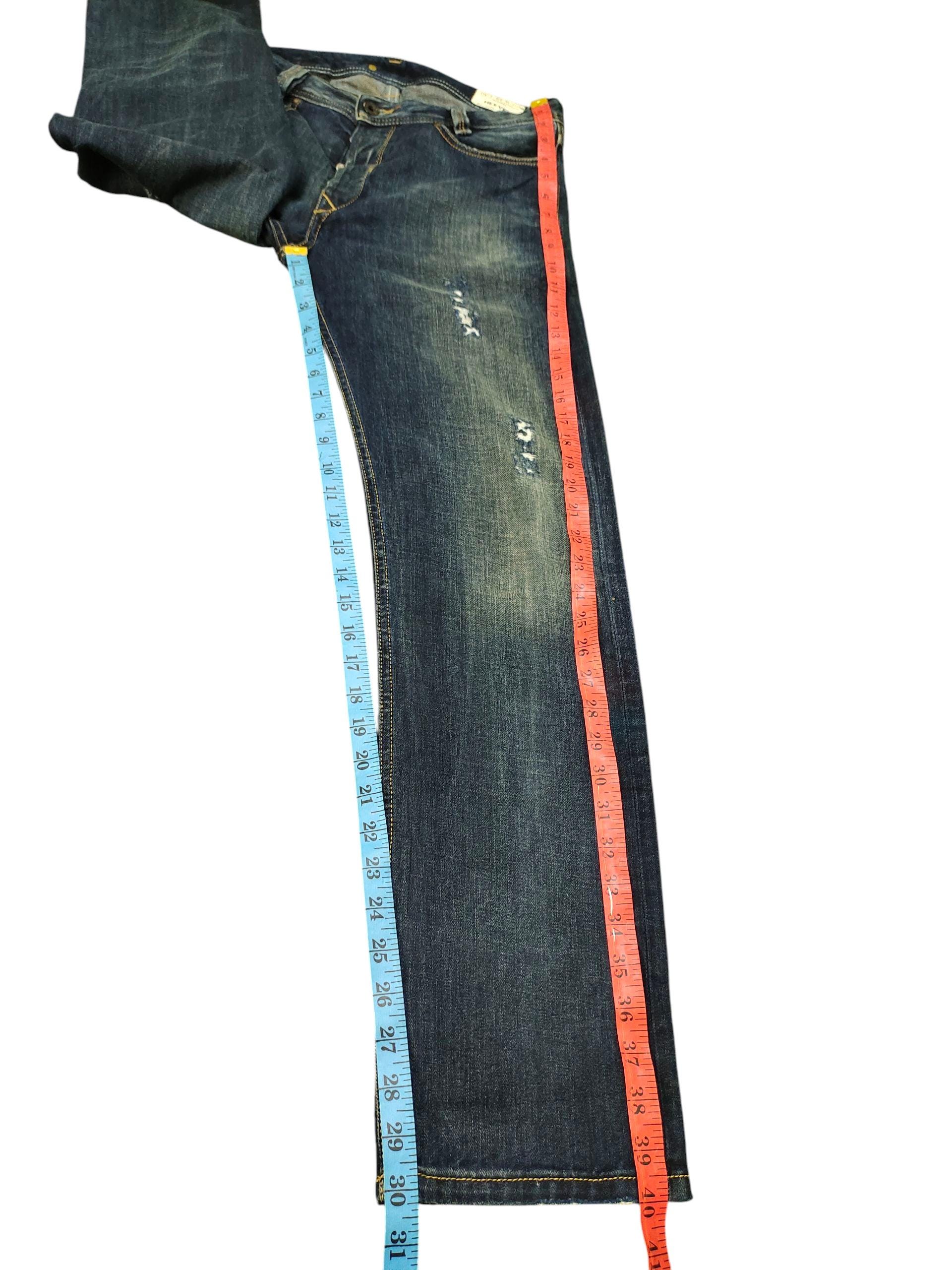 Vintage Y2K Diesel Heeven Jeans: Clawmark Distress, Faded Denim