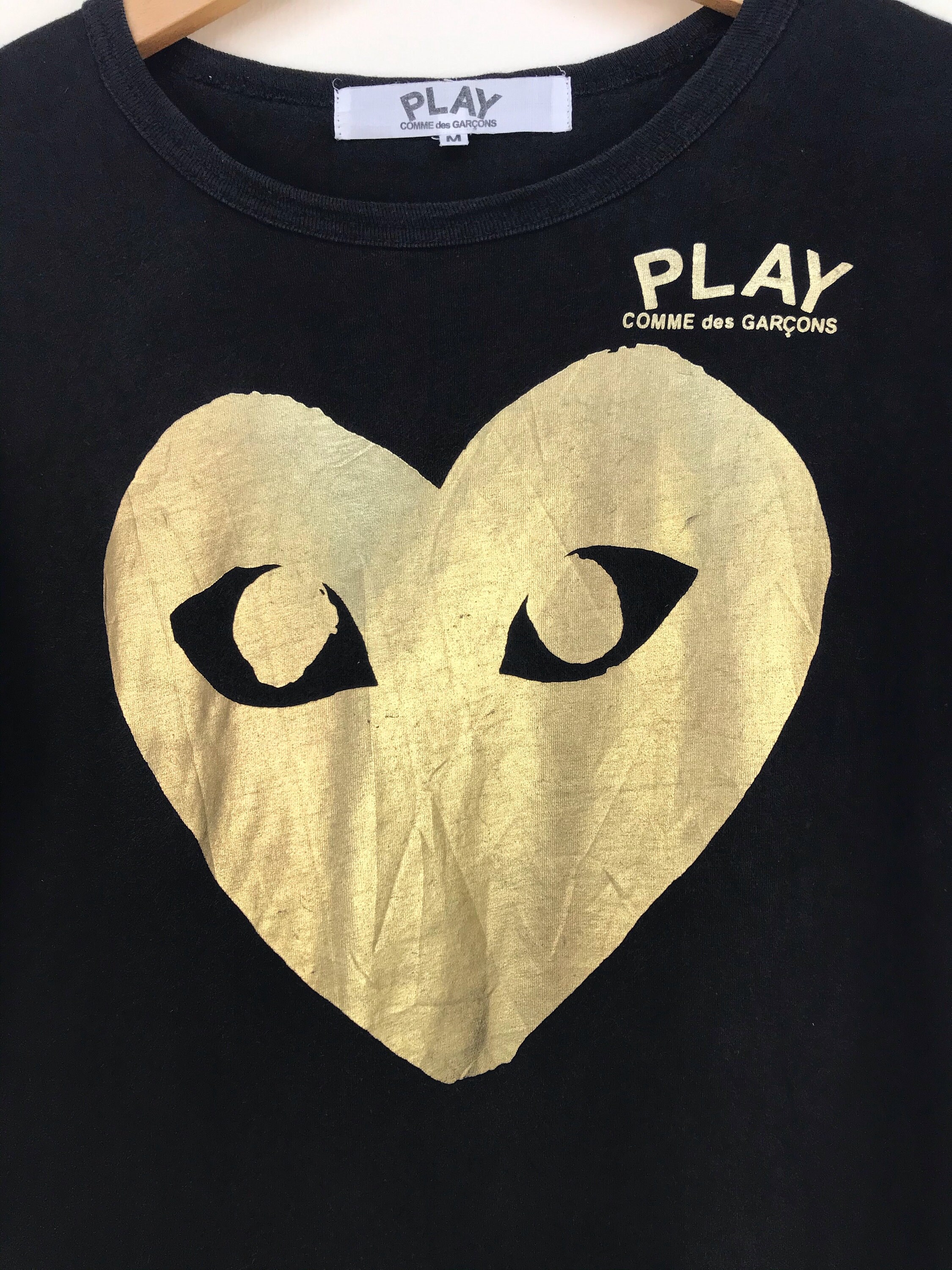 comme des garcons black and gold shirt