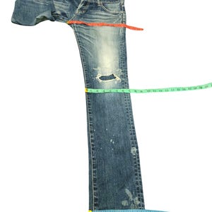 May include: A set of three ceramic mugs with a speckled, matte finish. The mugs are in shades of cream, light gray, and dark gray. Each mug has a simple, minimalist design, perfect for coffee or tea.