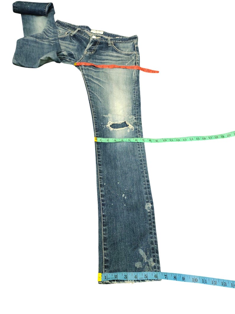 May include: A set of three ceramic mugs with a speckled, matte finish. The mugs are in shades of cream, light gray, and dark gray. Each mug has a simple, minimalist design, perfect for coffee or tea.