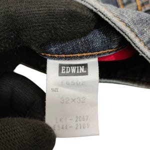 May include: A rustic wooden sign with the text "Welcome to our home" in a handwritten style. The sign features a distressed finish and a simple, inviting design, perfect for a front porch or entryway.