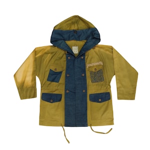 May include: A yellow and blue hooded jacket with multiple pockets and a drawstring waist.