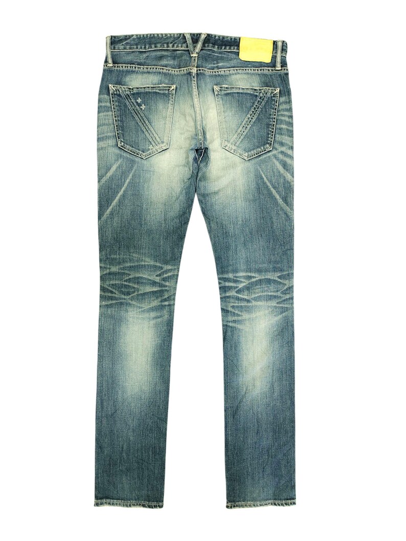 May include: A white ceramic mug with a black handle and the text "But First, Coffee" in a black, bold font. The mug is on a white surface. The mug is 4 inches tall.