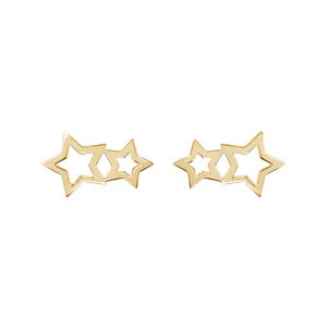 May include: A pair of gold-tone earrings featuring three interlocking star shapes.
