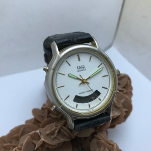 Vintage Watch – Q&Q QUARTZ , oude horloges Zwitsers