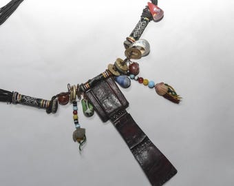 Talisman Touareg , Tribal Leather Pouch Necklace with Mixed Glass Beads and Charms