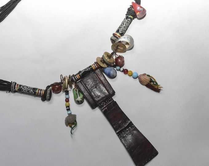 Talisman Touareg , Tribal Leather Pouch Necklace with Mixed Glass Beads and Charms