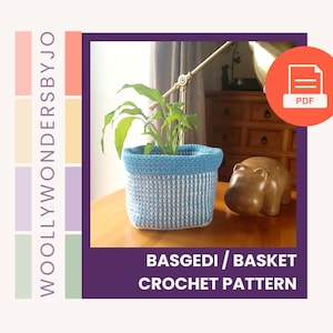 May include: A crochet basket pattern in blue and white, with the title "Basgedi/Basket Crochet Pattern" and the text "Woolly WondersbyJo" on the side.