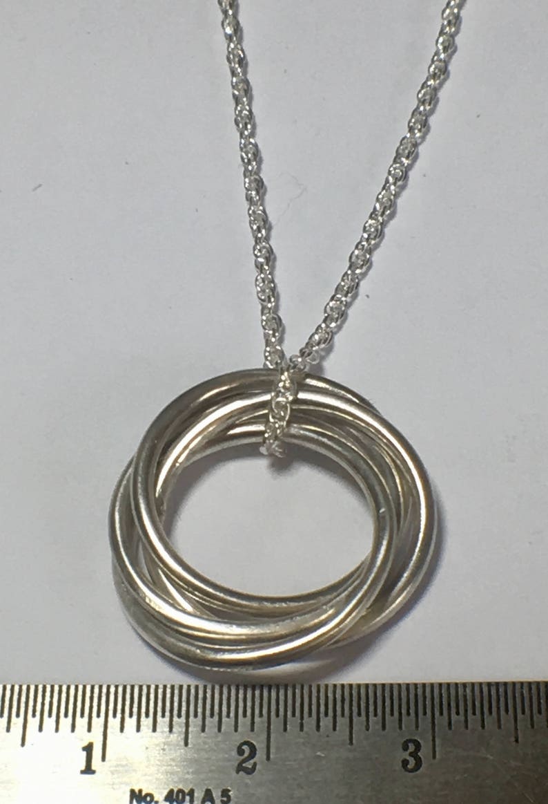 Entwined ring necklace Clearance