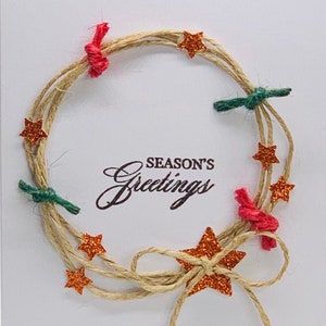Season&#39;s Greetings Christmas Wreath