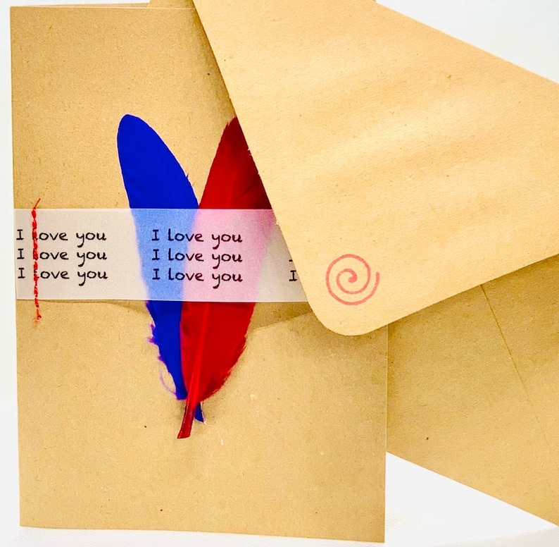 Feathers On Brown Card