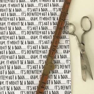 Book themed wrapping paper for a funny gift wrap idea or literary present