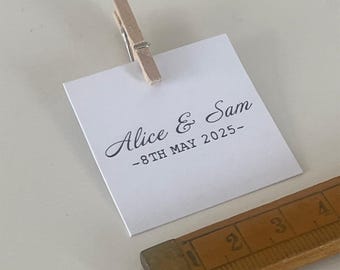 Wedding place card decorations featuring names and date