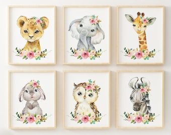 May include: Set of six watercolor animal prints featuring a lion, elephant, giraffe, bunny, owl, and zebra. Each animal is wearing a floral crown and surrounded by pink and green flowers.