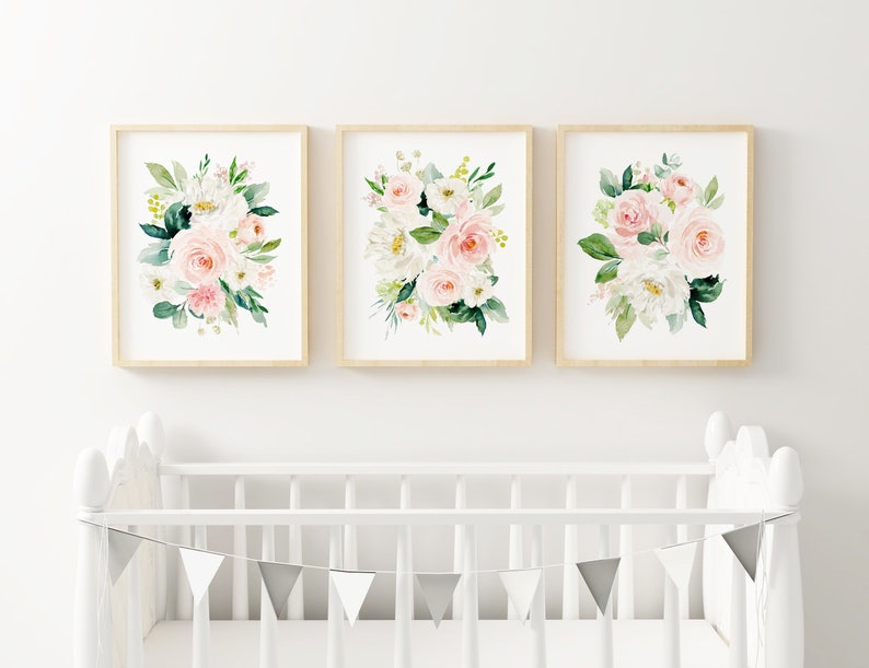 May include: Three framed prints with watercolor floral designs. Each print features a bouquet of pink and white roses with green leaves.