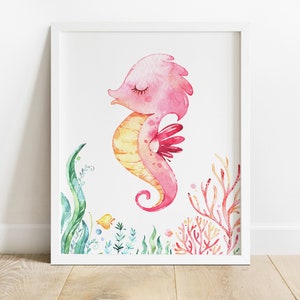 May include: A watercolour illustration of a pink and yellow seahorse with closed eyes, surrounded by green and red seaweed.