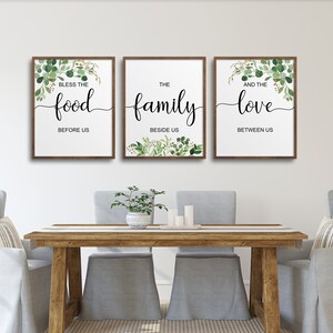 May include: Three framed prints with green foliage and white backgrounds. The prints feature the text "Bless the food before us", "The family beside us", and "And the love between us".