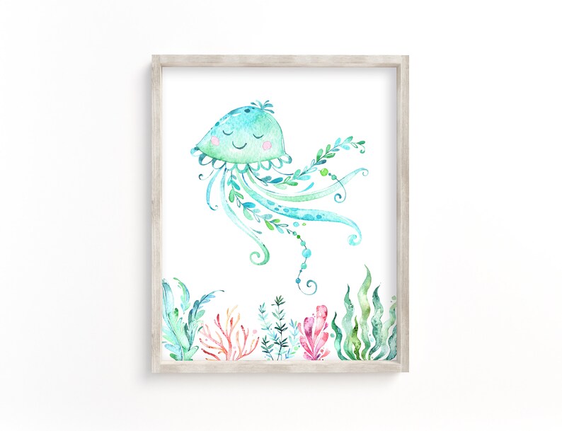 May include: A watercolour painting of a blue and green jellyfish with a smiling face. The jellyfish is surrounded by green seaweed and coral.