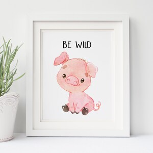 May include: A watercolor illustration of a pink piglet with a cute expression. The piglet is sitting on its hind legs with its front legs crossed. The text "BE WILD" is written above the piglet.