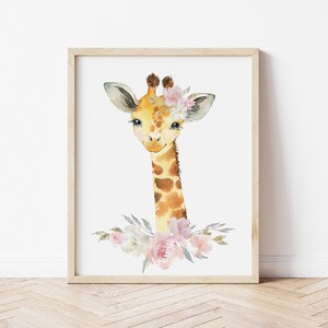 May include: A watercolour painting of a giraffe wearing a floral crown. The giraffe is looking directly at the viewer. The background is white.