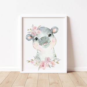 May include: A watercolour painting of a grey hippopotamus with pink flowers around its head. The hippopotamus is smiling and looking at the viewer. The background is white.