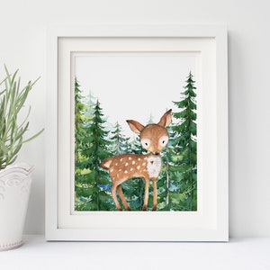 May include: A watercolor painting of a fawn standing in a forest. The fawn is brown with white spots and has a small red heart on its chest. The forest is made up of tall green pine trees.