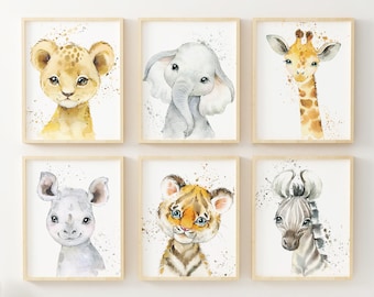 May include: Set of six watercolor animal prints featuring a lion, elephant, giraffe, rhinoceros, tiger, and zebra. Each print has a white background with watercolor splatters and is framed in a light wood frame.
