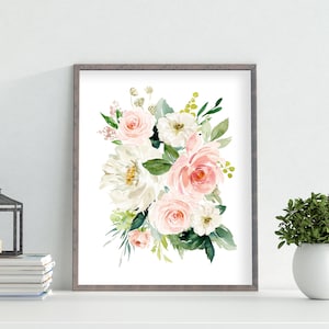 May include: A framed watercolor painting of a bouquet of pink and white flowers with green leaves. The flowers are arranged in a loose, natural style.