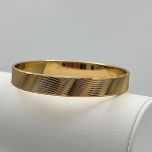Monet, 70s vintage etched gold plated bangle