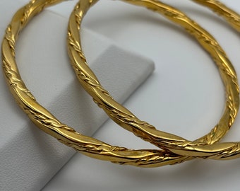 Monet, 80s vintage pair of gold plated bangles