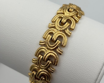 Monet, “Raging Seas” 60s vintage gold plated link bracelet