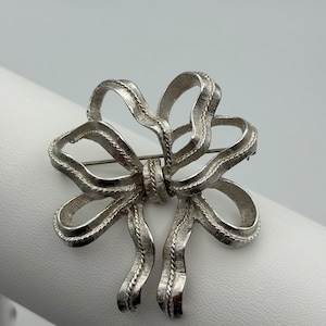 Monet, 80s vintage silver plated ribbon bow brooch