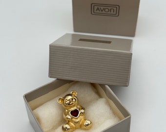 Avon, 80s new vintage gold plated January garnet teddy bear pin, in original box,