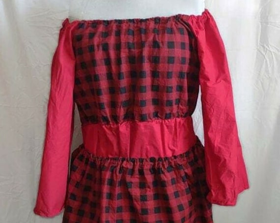 Red plaid top and skirt combo.
