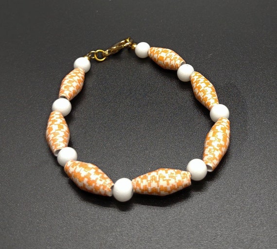 B-1619 Orange and white paper bead bracelet.