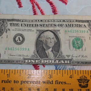 Series 1969 One US Dollar note ERROR Mis cut - Misaligned